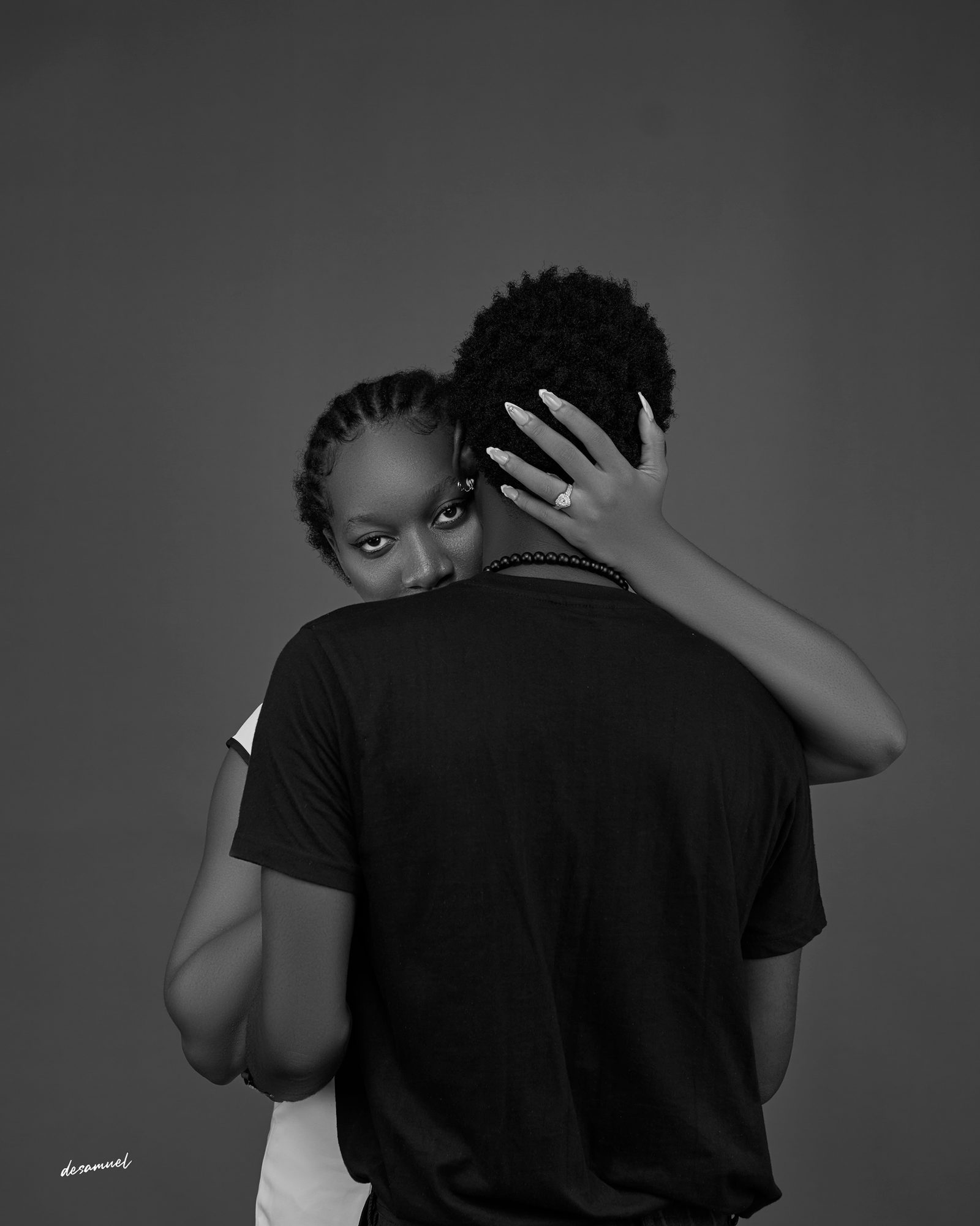 The couple holding each other